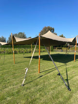 Ratchet strap with carabiner attached to a stretch tent